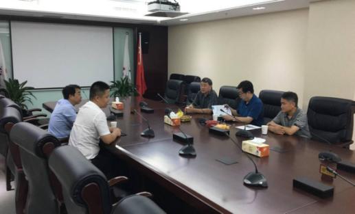 合肥市房产局、安徽国华建设公司向导一行到安建物业公司考察交流